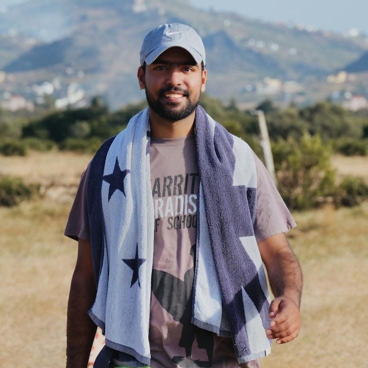 Kaveri Mehta, Lead Design Curator at Prime Vision Hub, reviewing corporate floral arrangements